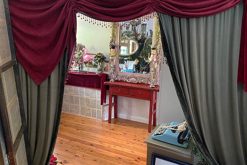 The Lair, through the curtains to front of house